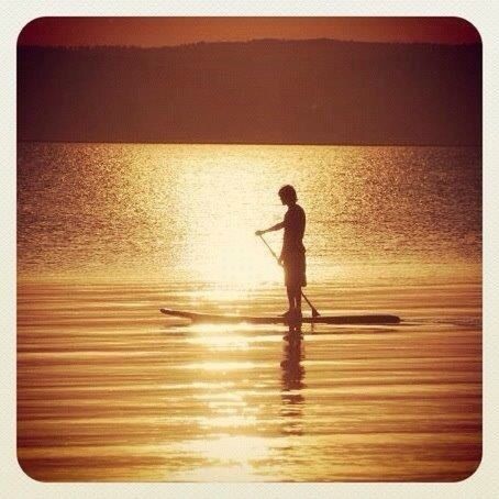 water, lifestyles, leisure activity, sunset, transfer print, full length, auto post production filter, sea, reflection, beach, standing, childhood, silhouette, shore, men, orange color, outdoors, boys