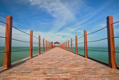 Scenic view of pier against sky