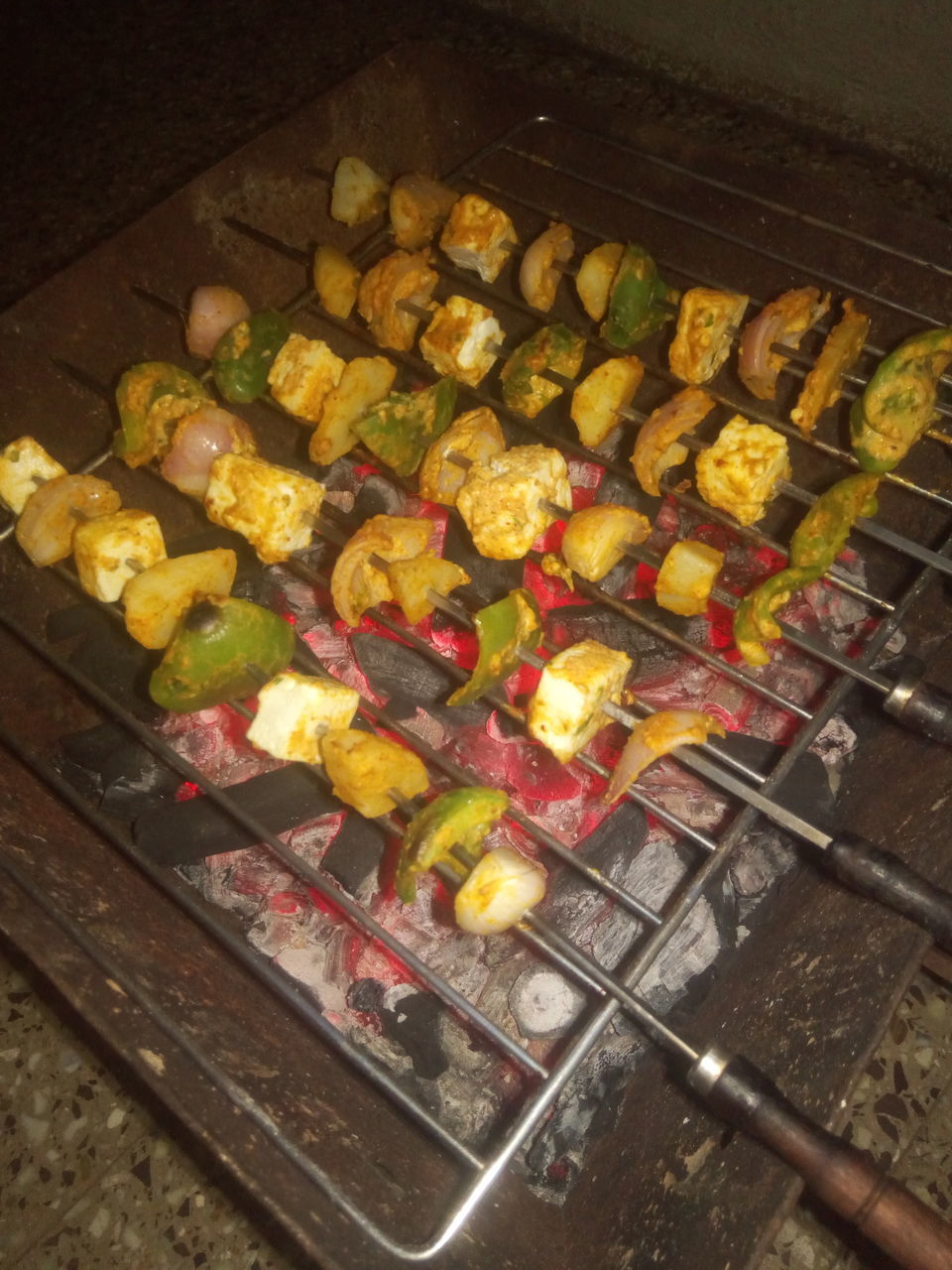 HIGH ANGLE VIEW OF VEGETABLES ON GRILL