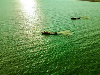 High angle view of boat floating on sea