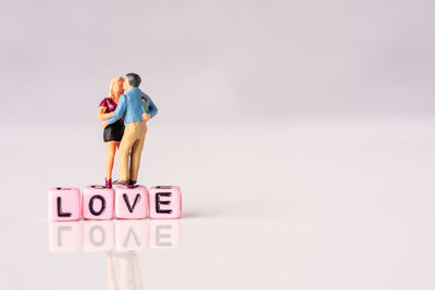 Low angle view of road sign against sky