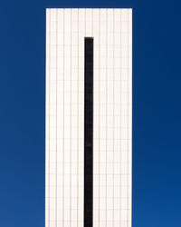 Low angle view of blue and white background