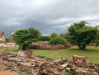 View of old ruins against cloudy sky