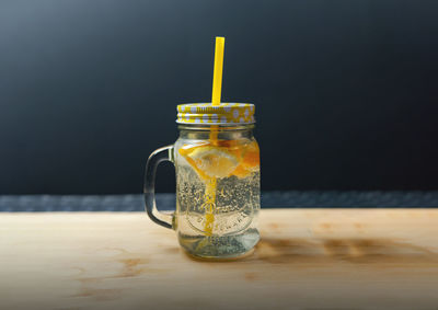 Close-up of drink in jar on table