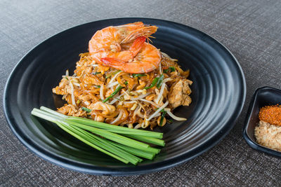High angle view of meat in plate on table