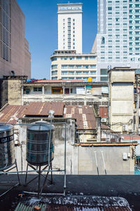 Buildings against clear sky in city