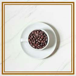 Directly above shot of coffee beans in bowl