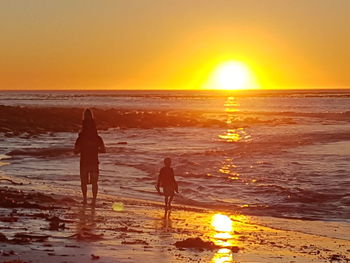 Scenic view of sunset over sea