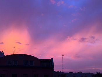 Low angle view of cloudy sky at sunset