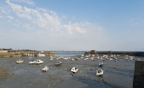 Boats moored at beach