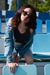 Portrait of young woman looking away