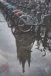 Reflection of bicycle on puddle