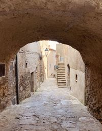 Narrow alley amidst old buildings