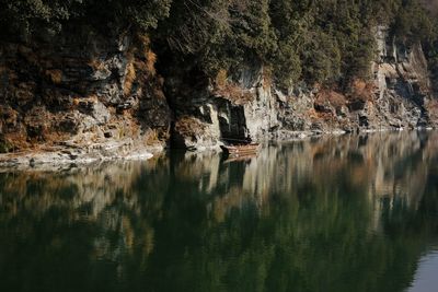 Reflection of rock formation in lake water