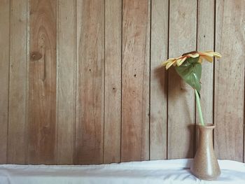 Close-up of flower vase on table