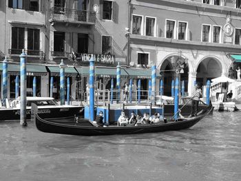 Boats moored at waterfront