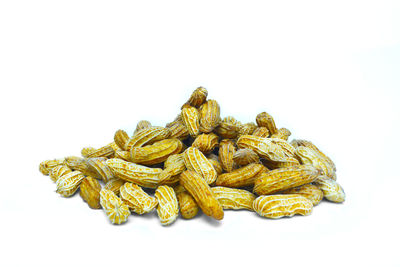 Close-up of bananas against white background