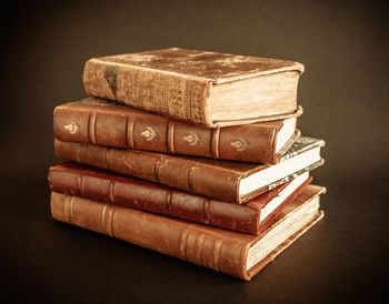 Close-up of objects on table against black background