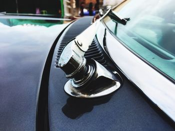 Close-up of car against sky