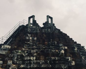 Low angle view of historic temple against sky