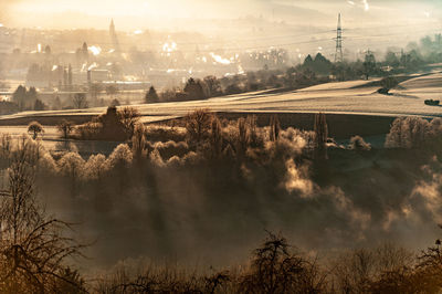 High angle view of townscape against sky during sunset