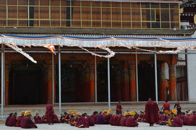 Group of people in front of building