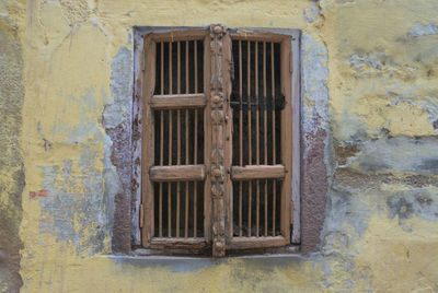 Closed window of old building