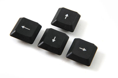 Close-up of computer keyboard against white background