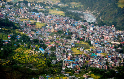 High angle view of townscape and mountain