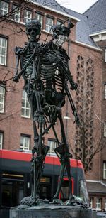 Low angle view of statue outside building