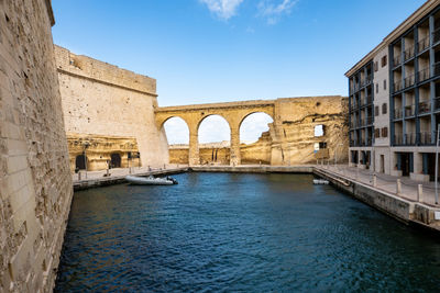 Arch bridge over river