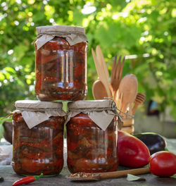 Close-up of preserves in jars on table