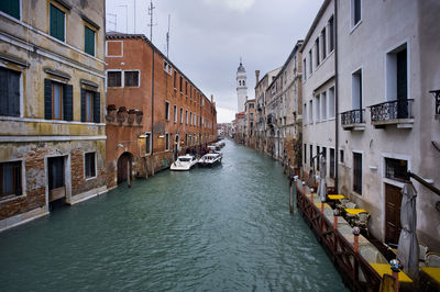 Grand canal amidst buildings