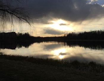 Scenic view of lake against sky during sunset