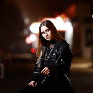 Portrait of young woman with long hair