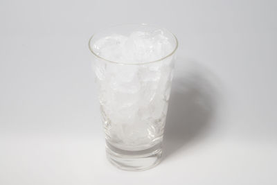 Close-up of drink over white background