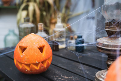 Close-up of pumpkin against orange background