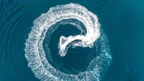 High angle view of sea seen through swimming pool