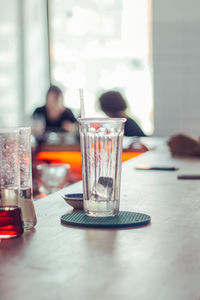 Close-up of beer glass on table at restaurant