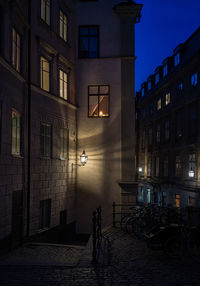 Buildings in city at night