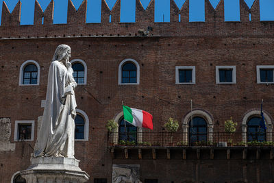 Dante alighieri's statue in piazza dei signori, verona, italy