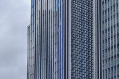 Low angle view of modern buildings against sky