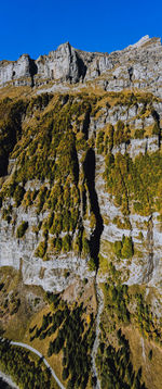 Low angle view of rock formation against clear sky