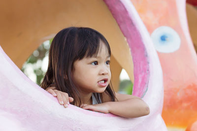 Portrait of smiling girl looking away