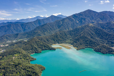 Aerial view of lake against mountain range