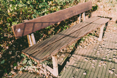 High angle view of bench in park