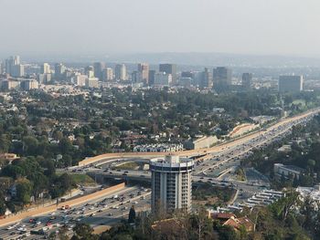 High angle view of street amidst buildings in city