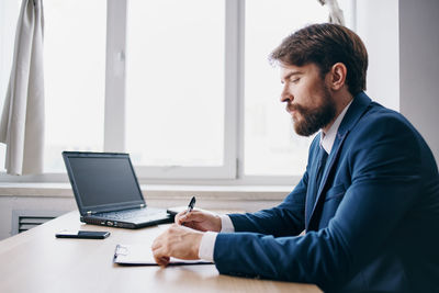 Businessman working at office