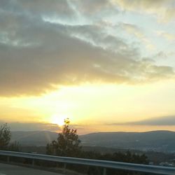 Scenic view of landscape against sky during sunset