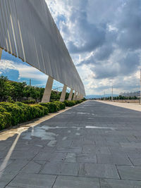 Road by street against sky